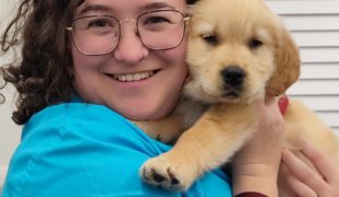 Dierenartsen De Nekker Hanne De Cat met puppy